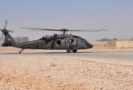 A Task Force 38 UH60 Black Hawk lands at the Riflestock FARP in Baghdad 