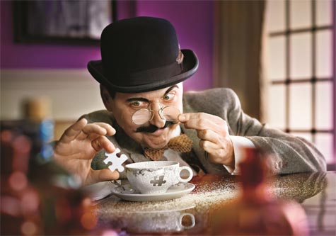 Actor David Hansen takes center stage, in Hercule Poirot fashion, as part of the Great Lakes Theater 2012 touring production of Agatha Christie's first mystery novel 