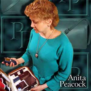 Anita Peacock with Peacock Purse for Diabetics