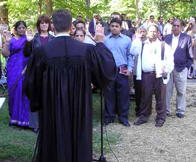 Honorable Judge Christopher Boyko swears in new US citizens