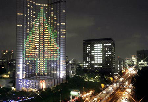 Tokyo 's nighttime neon display is projected onto the exterior of the Grand Prince Hotel Akasaka