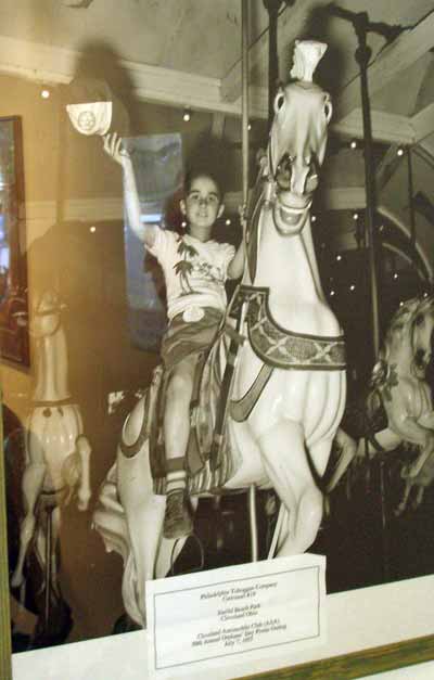 Boy riding carousel at Euclid Beach Park in 1955