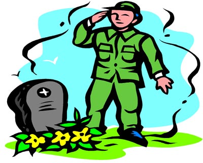 Veteran saluting a grave on veteran's Day
