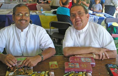 Father Nathan Uthariya and Deacon Joseph Bourge, head of the Clown Ministry at Blessed Sacrament