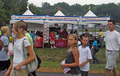 Visitng the Catholic Schools booths at the Catholic Fest