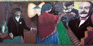 From mural painted on wall on Mayfield in Little Italy