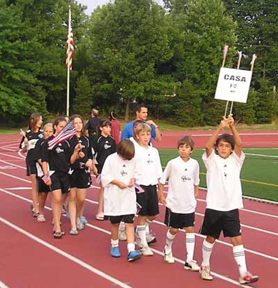 Soccer players in the Opening Ceremonies Parade