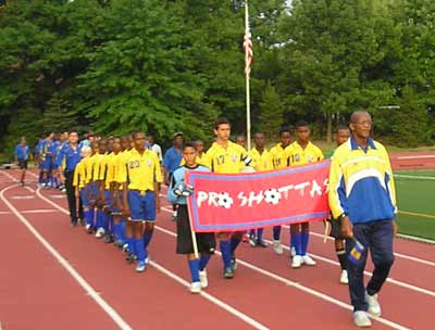 Soccer players from Barbados parade into Don Shula stadium