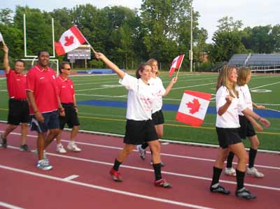 Soccer players from India parade into Don Shula stadium for Opening Ceremonies