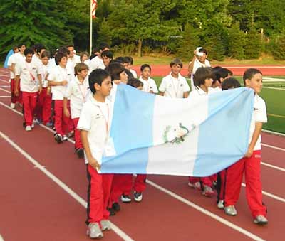 Soccer players from Guatemala parade into Don Shula stadium