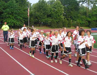 Soccer players in the Opening Ceremonies Parade