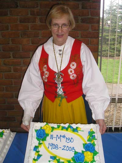 Marty Bergman with the 100 Year Cake