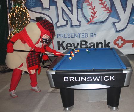 Indians Mascot Ketchup shoots pool