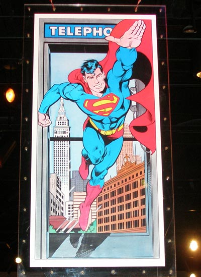 (photos by Dan Hanson) Superman flies out of telephone booth