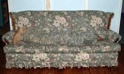 soldier camoflauged on couch hiding from chores