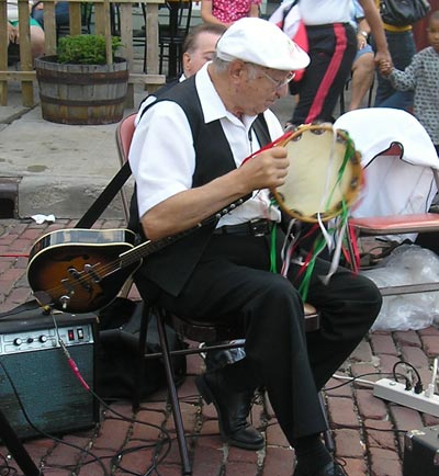 Primavera's Tony Ettorre on tambourine