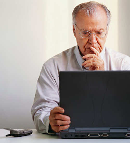 Older worker at laptop