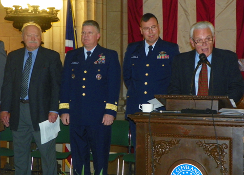 John Cimperman, Rear Admiral Fred Midgette, Commander Jeffrey Plummer and Tom Sweeney