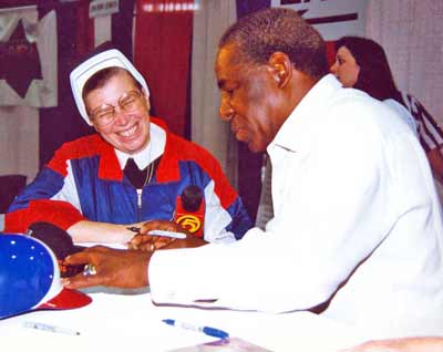 Sister Assumpta with Baseball Great Frank Robinson