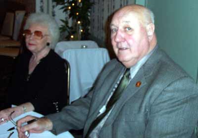 Bob Gain and wife Kitty signing autographs