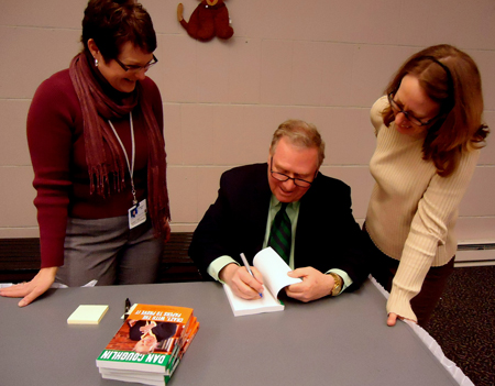 Dan Coughlin signing books