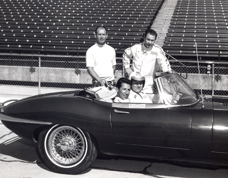 Dan Coughlin at wheel w Mario Andretti - Indianapolis Speedway - Standing from left Parnelli Jones and Lloyd Ruby