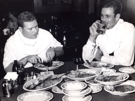 Dan Coughlin in eating contest with Indians 2nd baseman Vern Fuller at Pat Joyce's - Fuller won