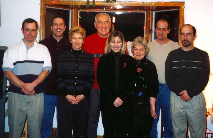 Pat and Gino Paoloni with children