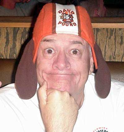 Bob 'Hoolihan' Wells wearing Cleveland Browns Helmet