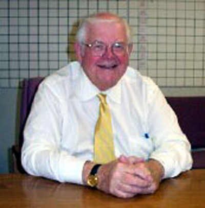 Bill Malley at his desk