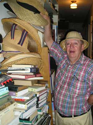 Richard Gildenmesiter with some of his summer straw hats