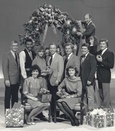 Tim Taylor, Denise D'Ascenzo, Dave Buckel, Casey Coleman, Dick Goddard, Big Chuck, Little John and others from the Channel 8 News Crew celebrate Christmas 1985