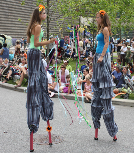 Girls on stilts at Parade the Circle in University Circle