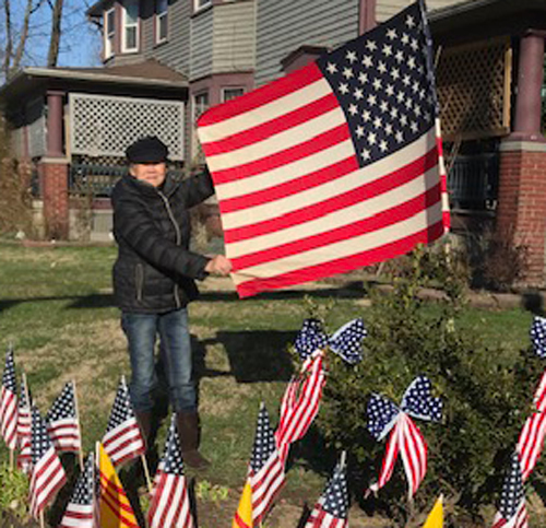 Gia Hoa Ryan and flags