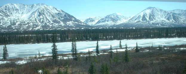 Mountains and Ice covered river