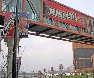 Sasha Pavlovic in front of Rise Up Banner