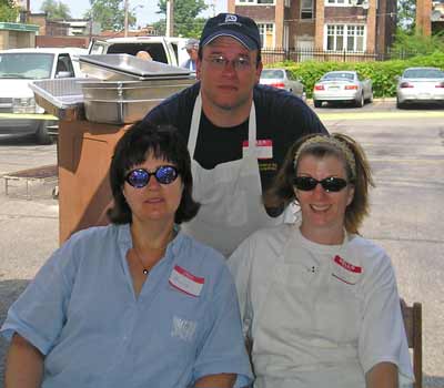  Brigid Drake Rob and Bridget MarokVolunteers at the St Philomena rib off