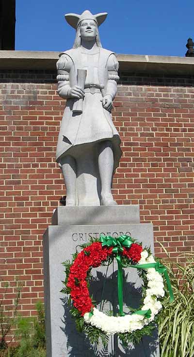 statue of Christopher Columbus with wreath