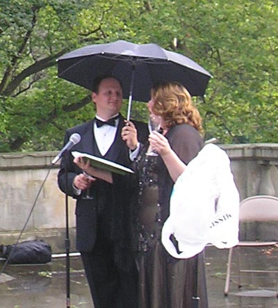Timothy Culver and Andrea Chenoweth under the umbrella