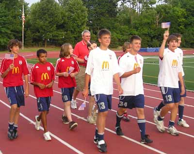 Soccer players in the Opening Ceremonies Parade