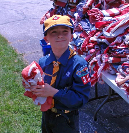 Cub scout with flag