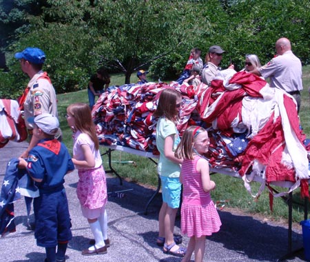 Some of the large quantity of US flags collected to be respectfully retired on Flag Day