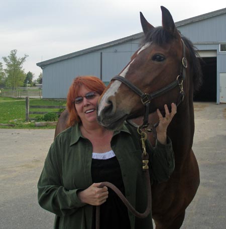 Debbie Hanson and her new friend Fancy, a Morgan/Belgian cross born in 1995