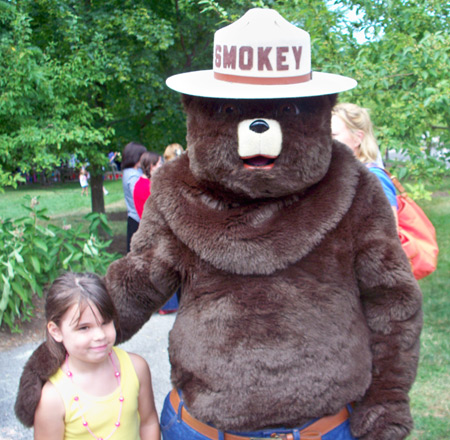 Smokey the Bear with little girl