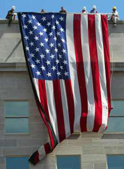 Flag being hung from the US Pentagon after September 11, 2001