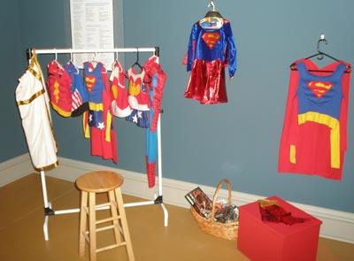 (photos by Dan Hanson) Superman, supergirl costumes