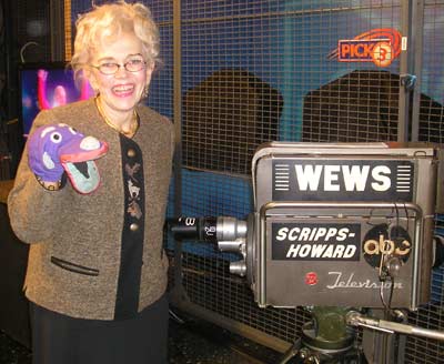 Ruth Sindelar with Dr. Buttons, the sock puppet her late husband Ernie Sindelar used on air.