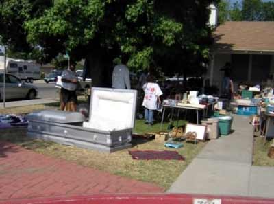 Coffin being sold in a garage sale