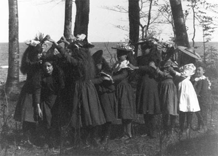 Girls playing London bridge