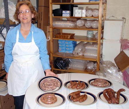Sharon Jesse of Old World Meats shows different kinds of sausage